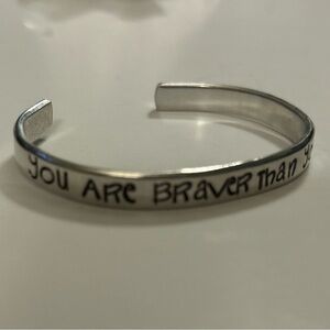 “You are braver than you Believe “ silver tone cuff bracelet